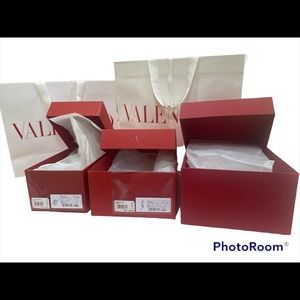 Two empty Valentino paper bag and three shoes Valentino garavani empty box